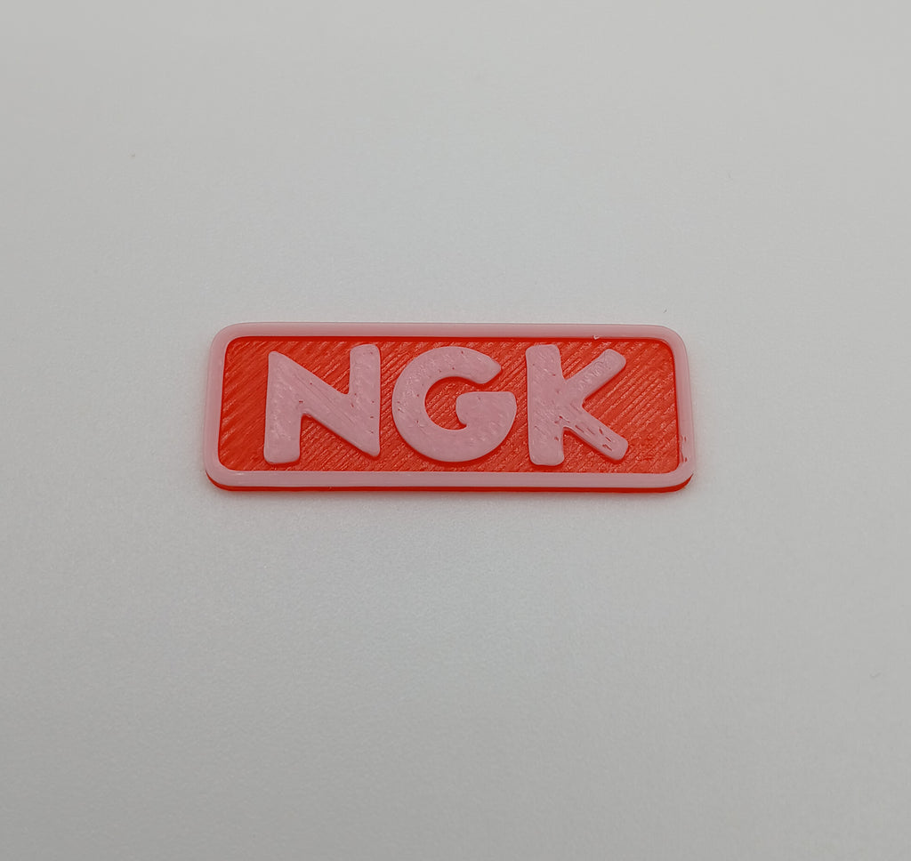 1:64 Scale Orange NGK Racing Banner – 3D Printed Garage Accessory