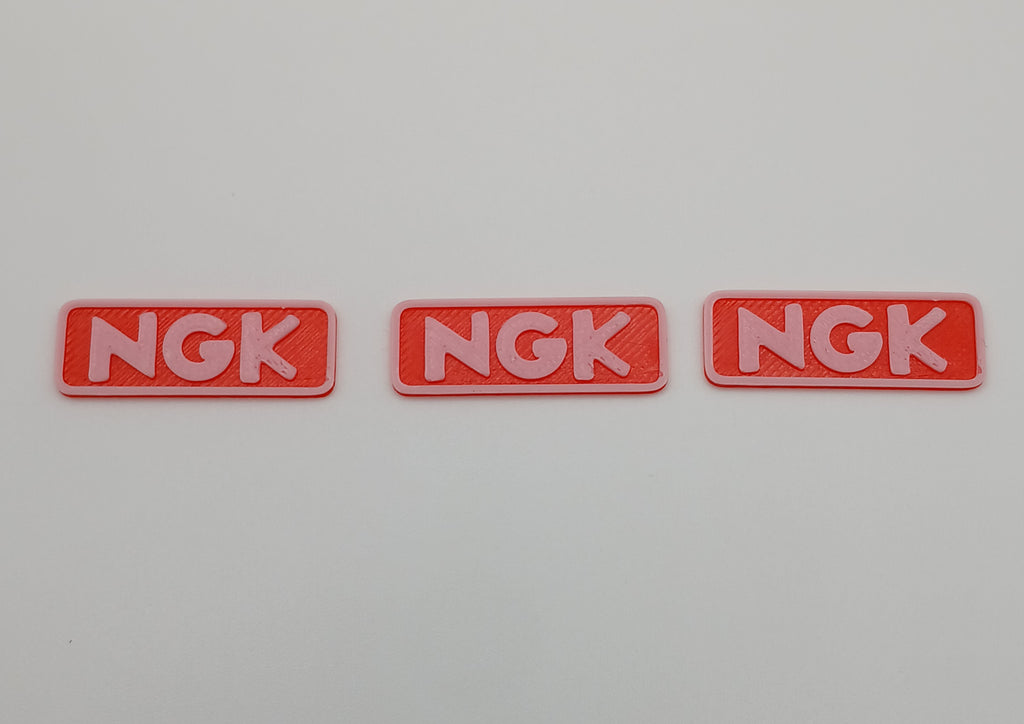 1:64 Scale Orange NGK Racing Banner – 3D Printed Garage Accessory